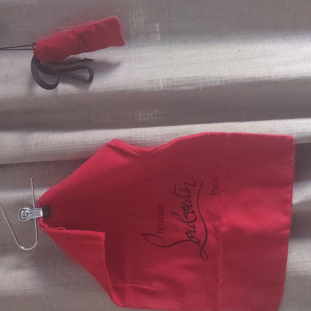 Christian Louboutin dust bag and laces